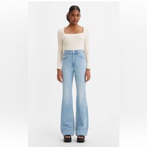 Levi’s Premium 70s High Flare Women’s Jeans with Distressed Details.